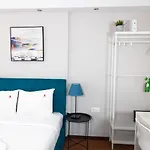 City Plaza Apartments & Rooms